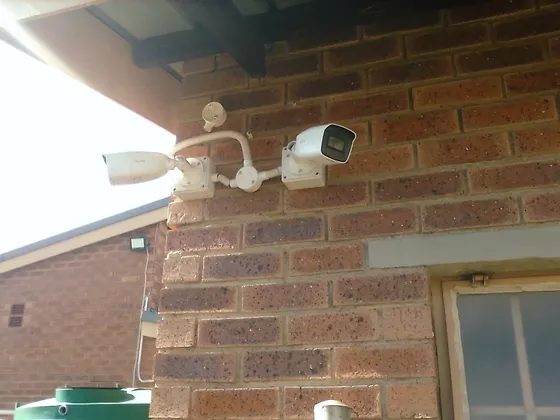 A closer view of the paired cameras, their mounting points and cable conduits.