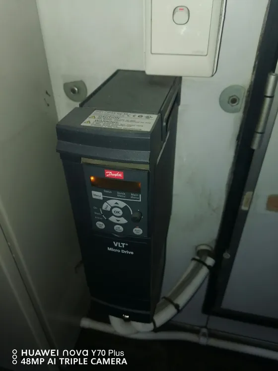 A control drive mounted inside an equipment cabinet.