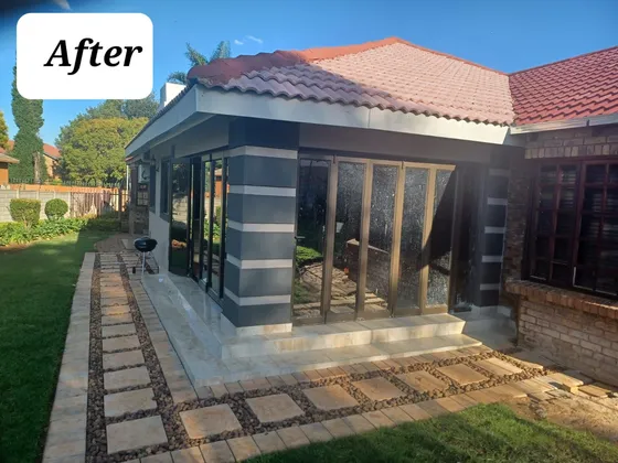 Glazed doors, a tiled roof and contrasting exterior finishes transform the original frontage.